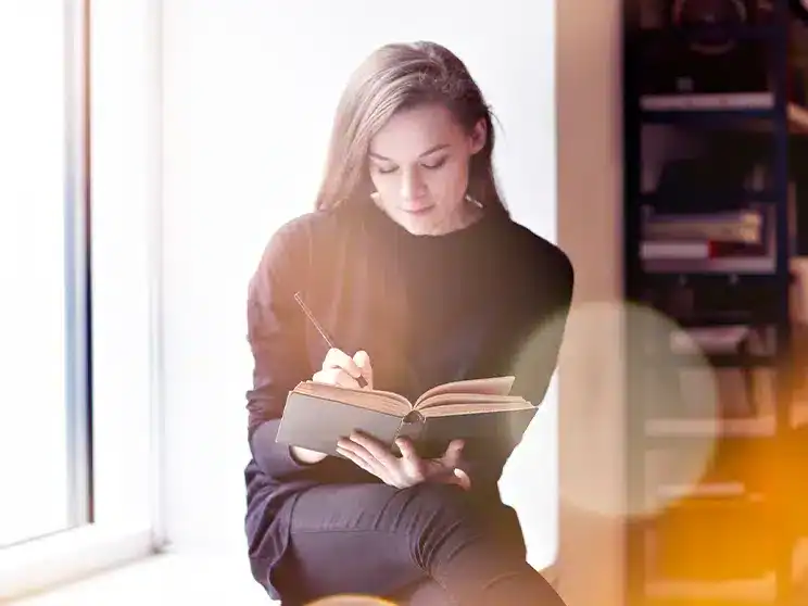 a female college student studying for an upcoming test