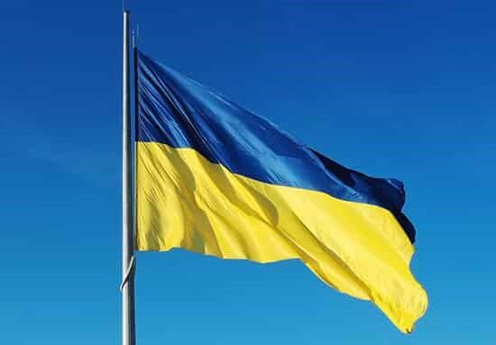 Ukraine flag blue sky background