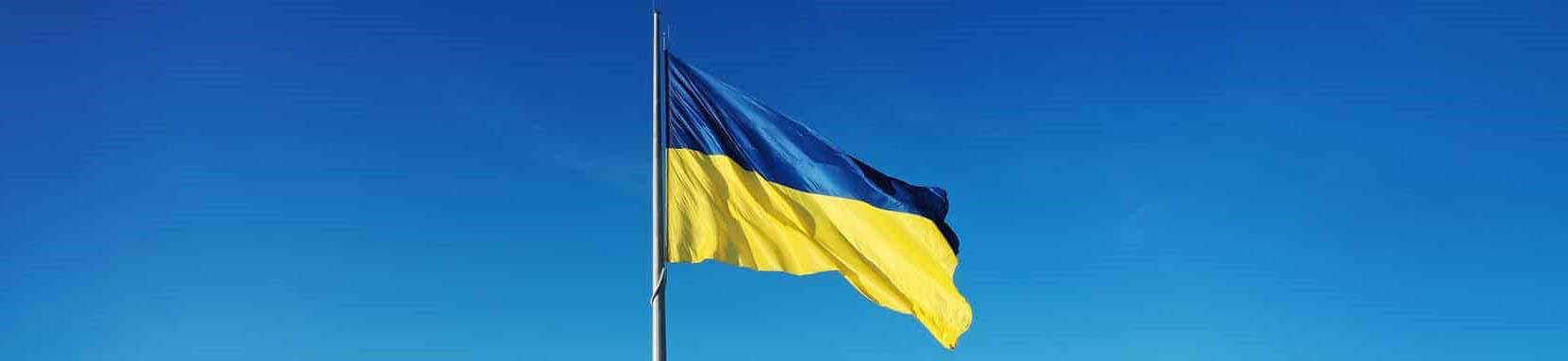 Ukraine flag blue sky background