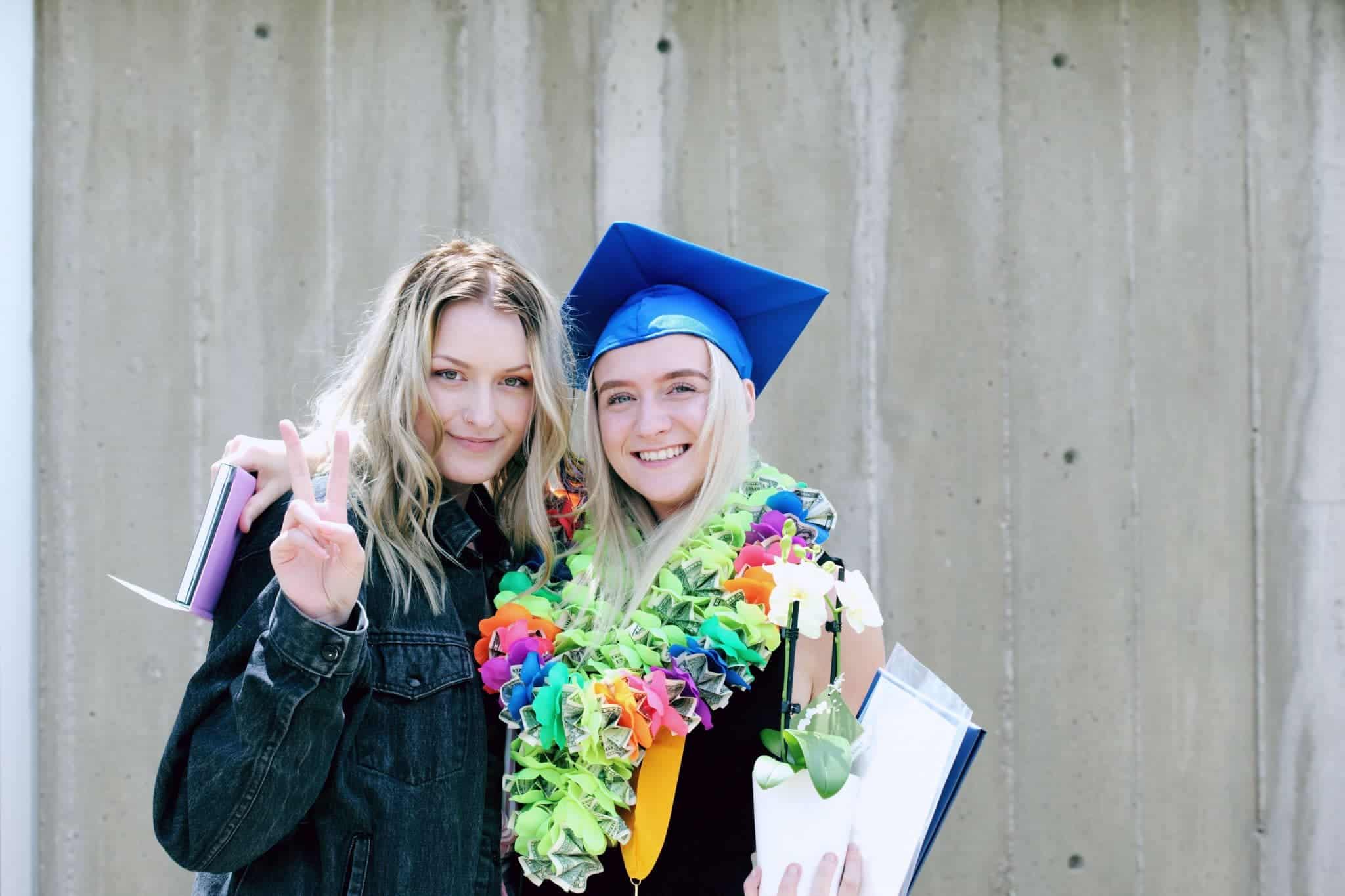 A girl supporting her friend who has just graduated from college