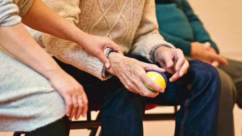 A University of the People student visiting the elderly.