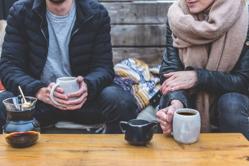 Two University of the People students enjoying a coffee break from studying.