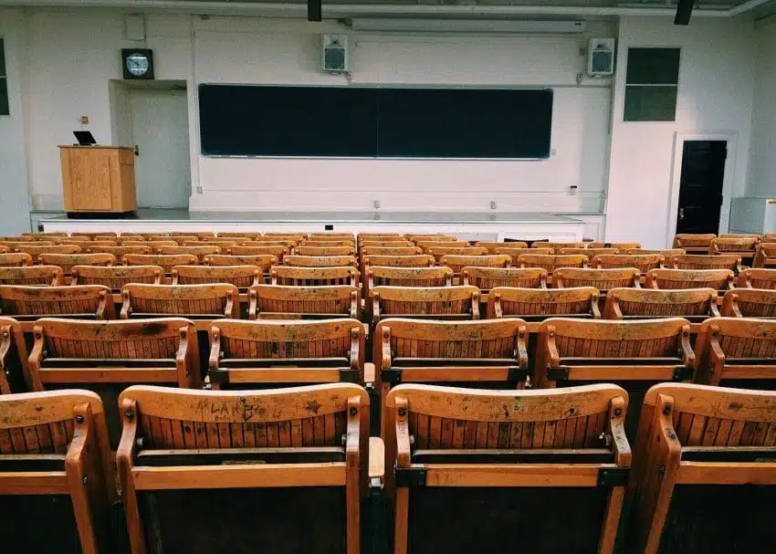 Empty rows of chairs in college classroom