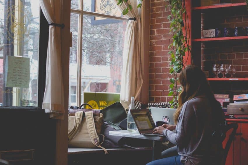 Woman using laptop to study online