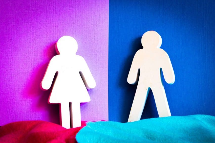 Male and female cut out over blue and purple background