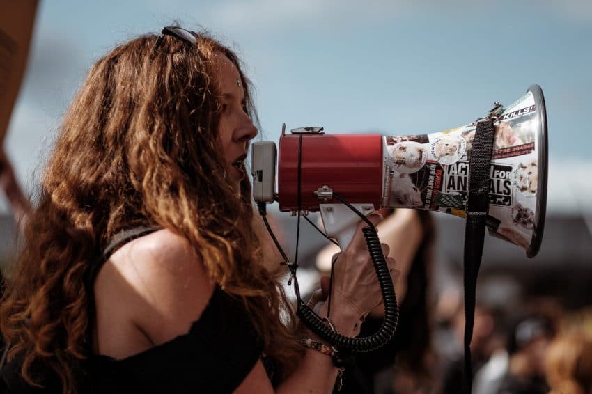 University of the People student with megaphone