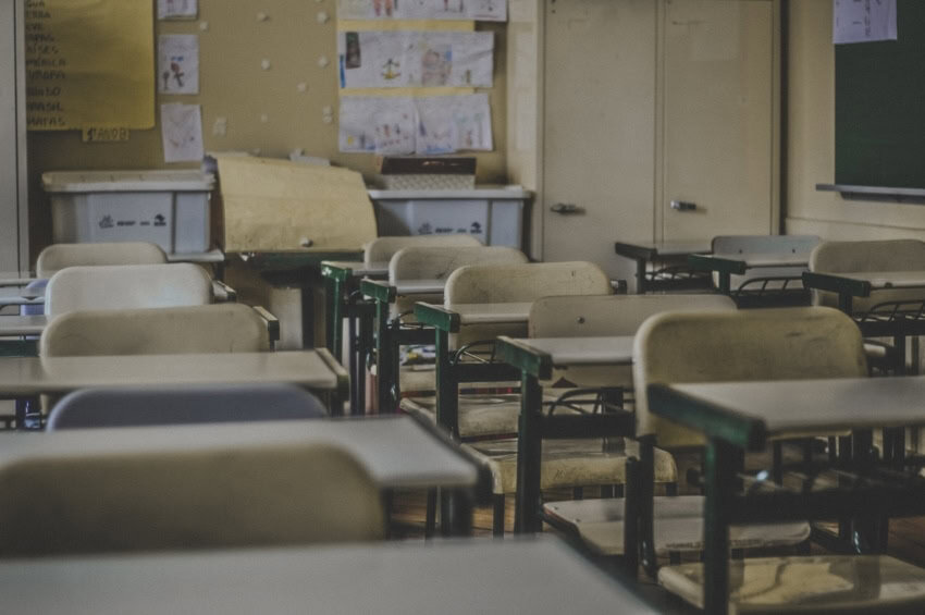 Empty classroom chairs