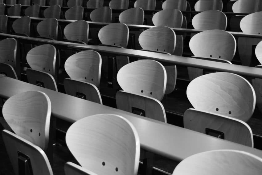 University classroom empty chairs black and white