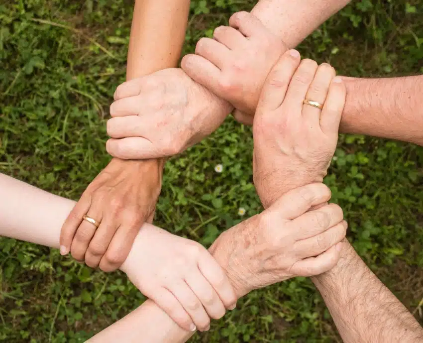essay on family holiday A family holding hands to show how much they support each other