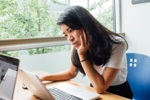 Student on a laptop to submit a college application