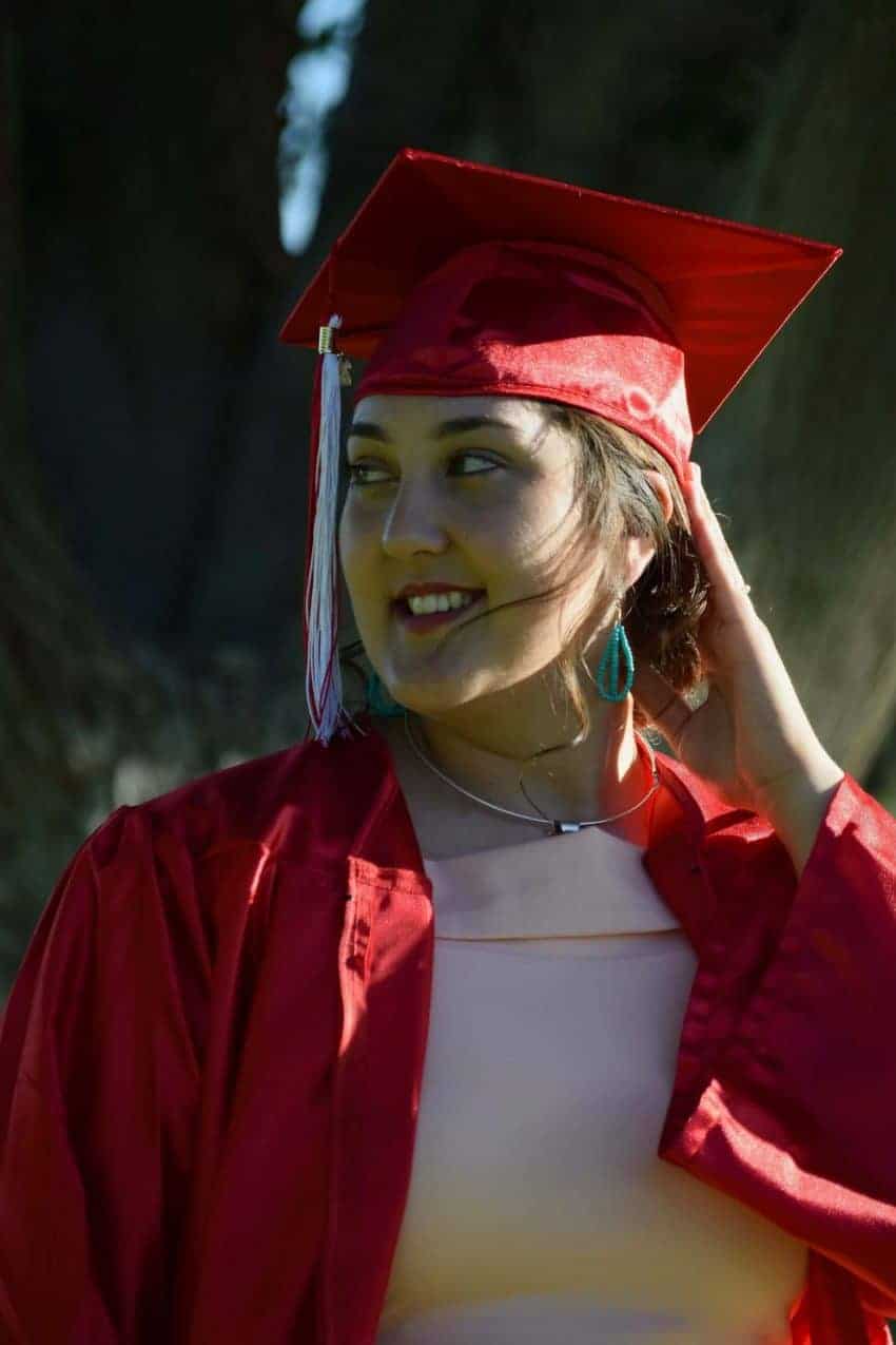 Female college graduate in cap and gown