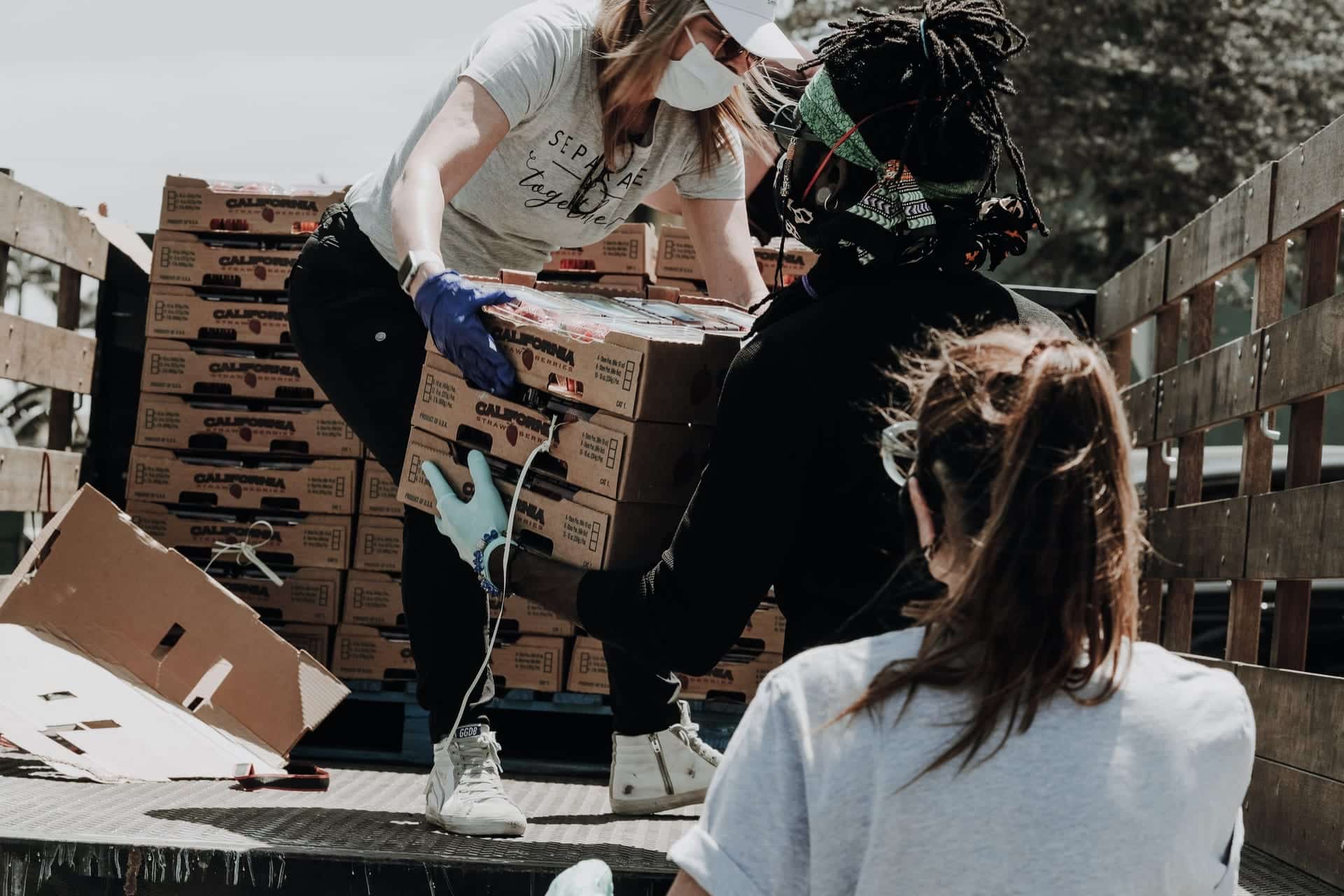 People working for a non-profit to deliver food to the needy