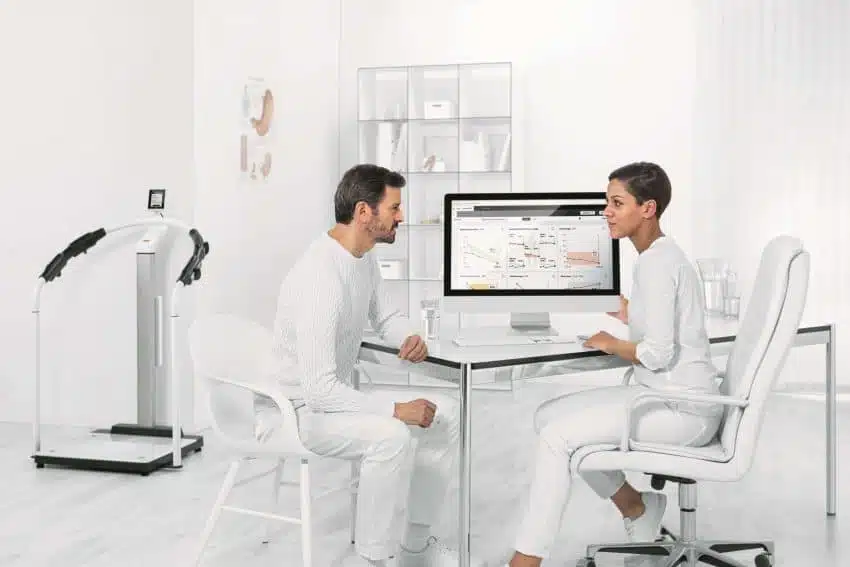 Epic certified employees at desk on computer