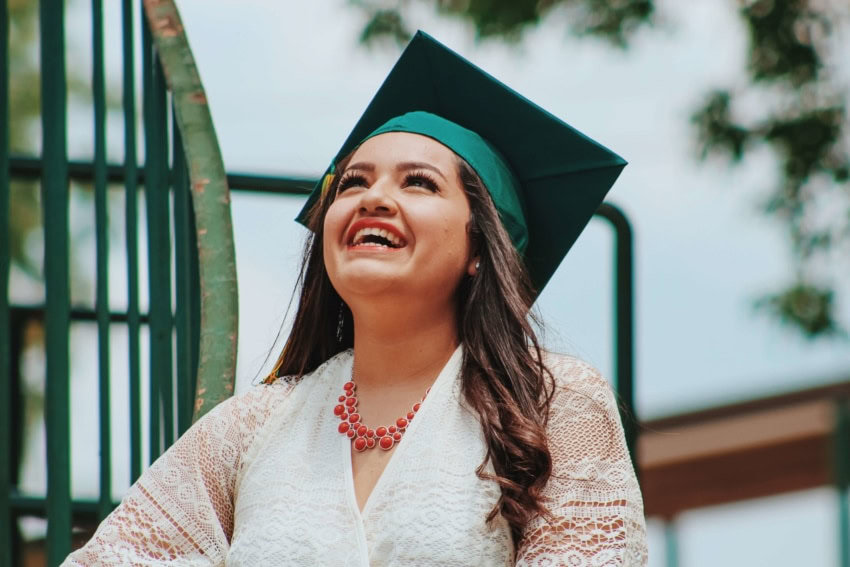 A student who is very excited about the benefits of affordable college education