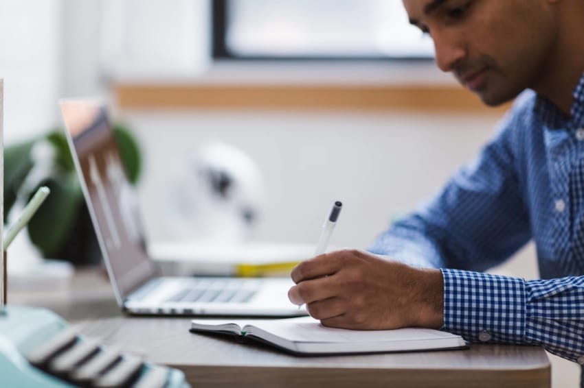 A male student studying an online degree in Canada.