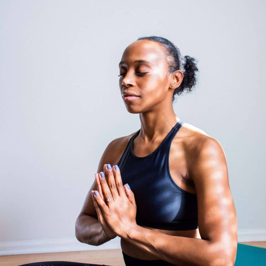 Woman practicing meditation and mindfulness