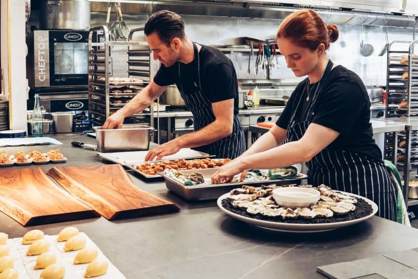 Two chefs working in the kitchen at a restaurant