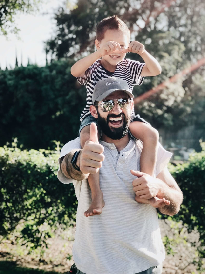 UoPeople student spending time with his child