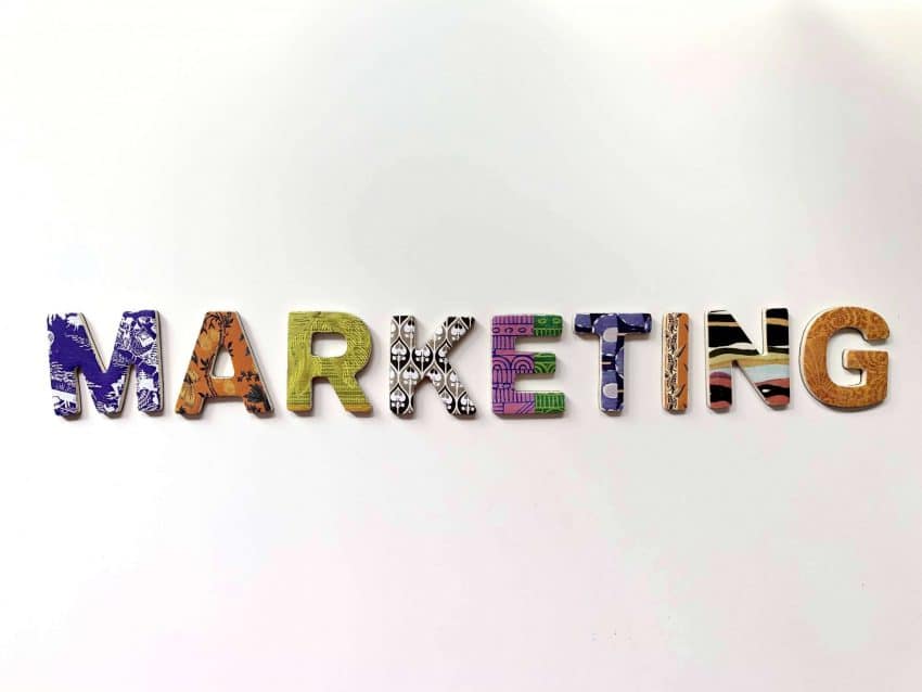 Marketing displayed in colored letters on white background