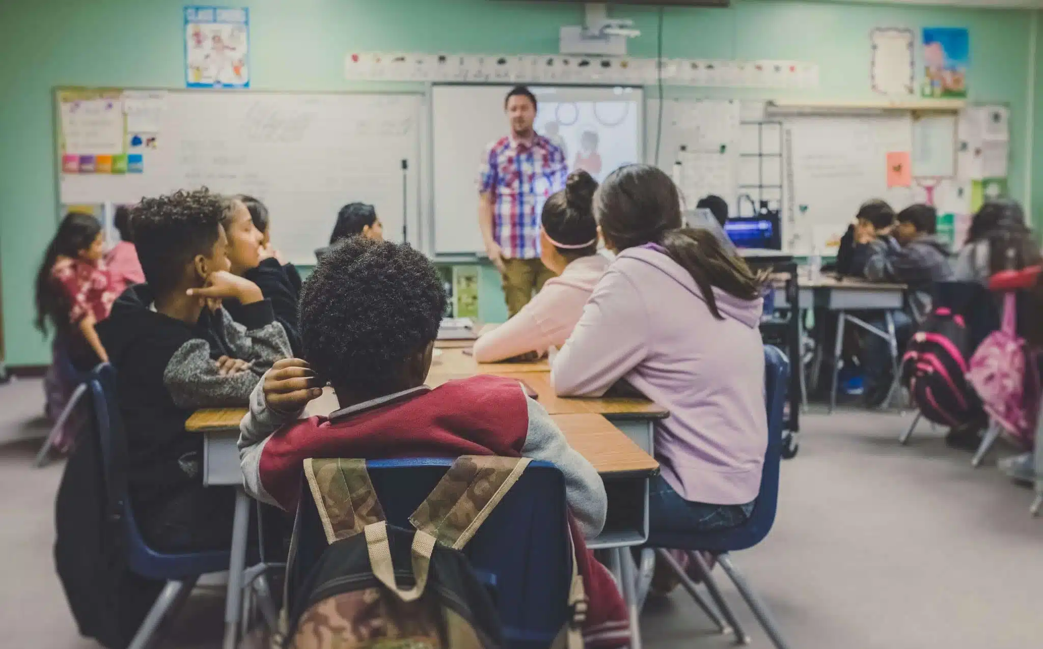 Teaching social studies to students in classroom