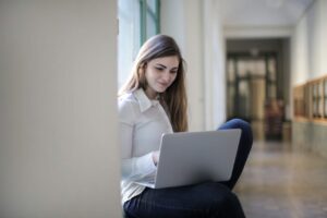 woman studying on laptop