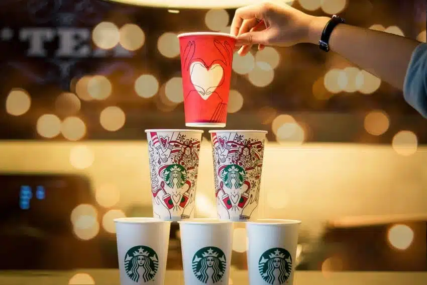Starbucks cups stacked in three levels