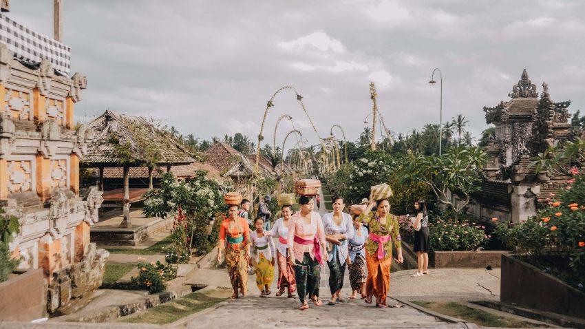 Group of Indonesian women walking in park