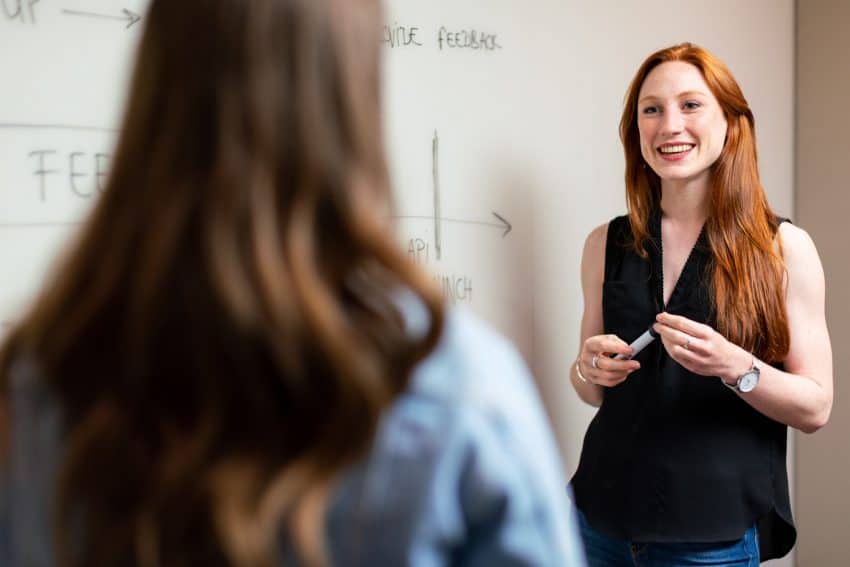 Teacher in front of a whiteboard