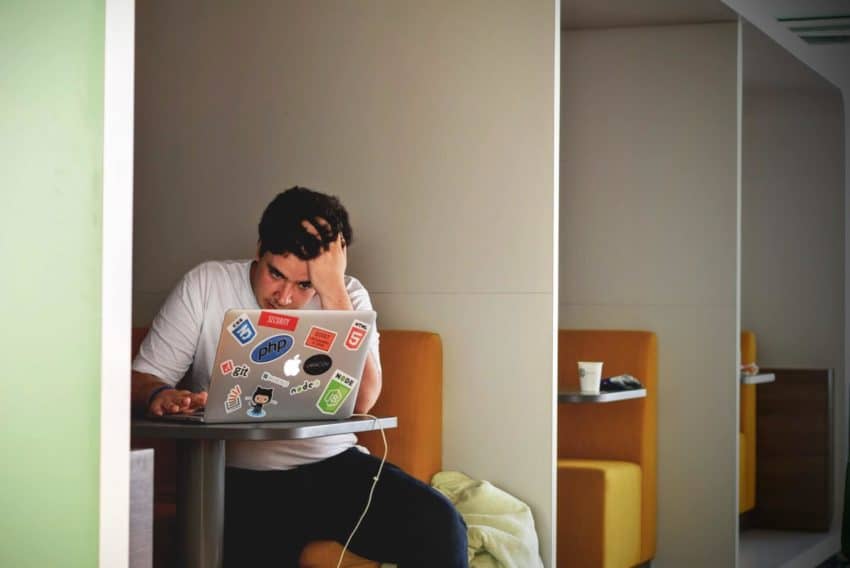 Anxious man at computer