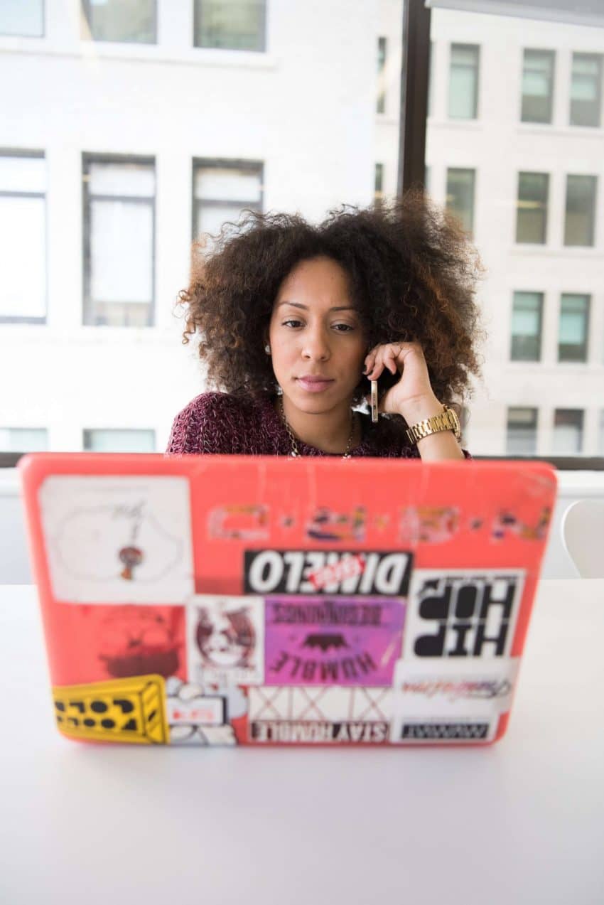 University of the People student studying online class with laptop