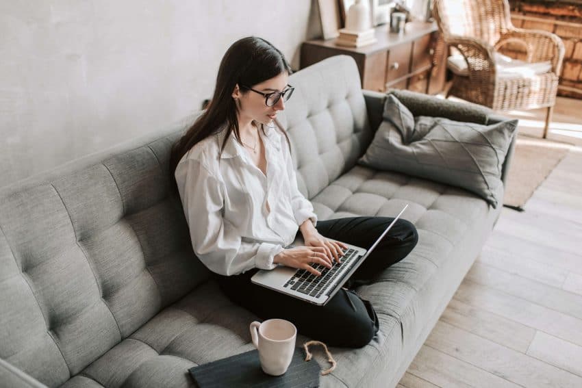 University of the People student studying at home on laptop