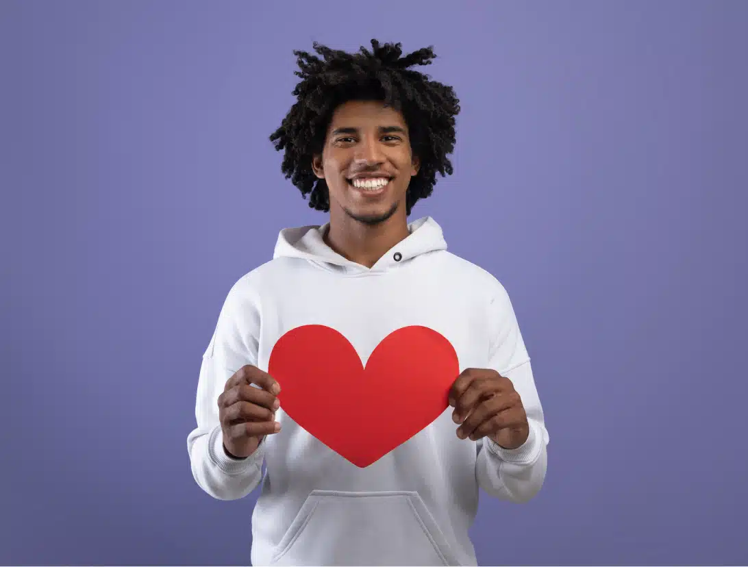 more ways Student holding heart shape paper image