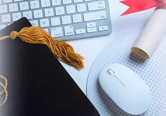 Mouse, toga hat, diploma on table