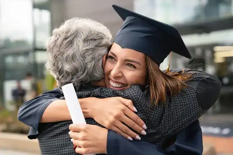 a female graduate celebrating at her convocation ceremony