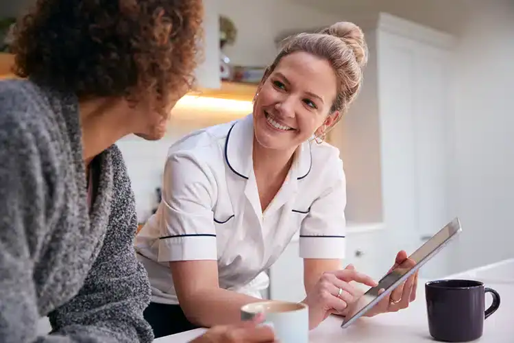 a female social worker working with her client