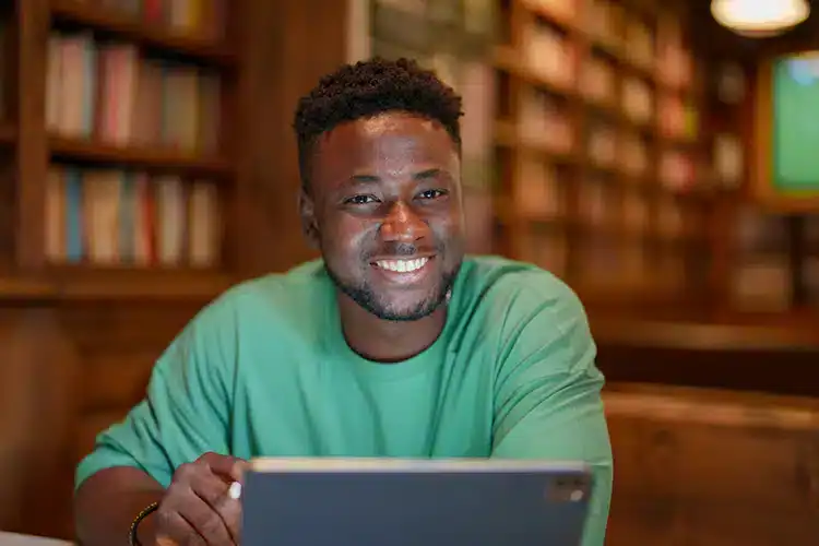 a male college student smiling