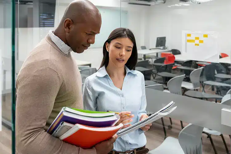 two master's degree aspirants discussing MBA vs MS degree options