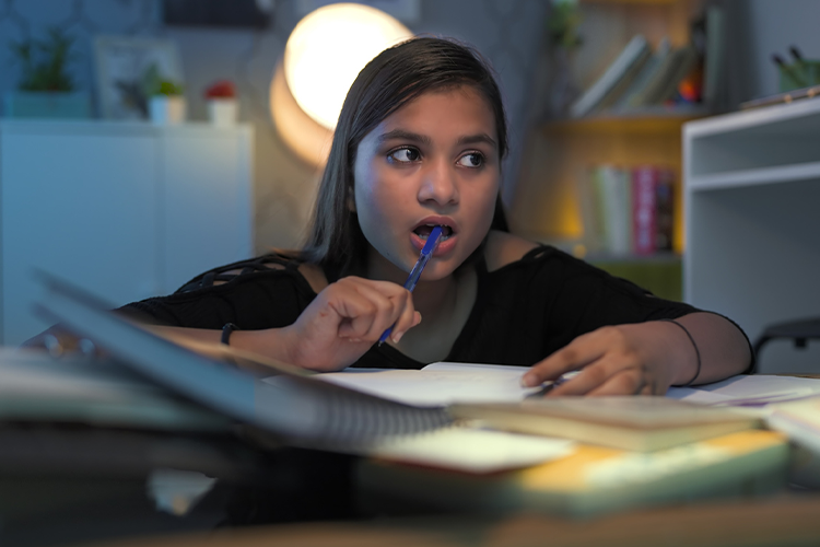 a female MBA student earning her degree online