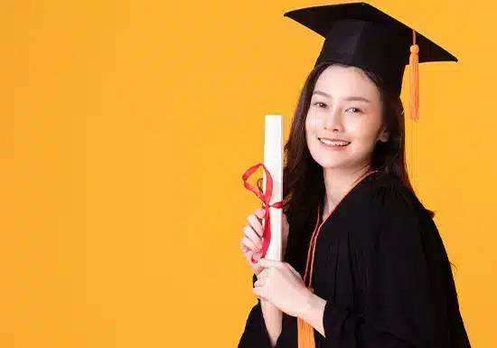 Webify Folder blog 18 MBA vs MS Which degree should you pursue in 2024_Header a female graduate posing for a graduation day headshot