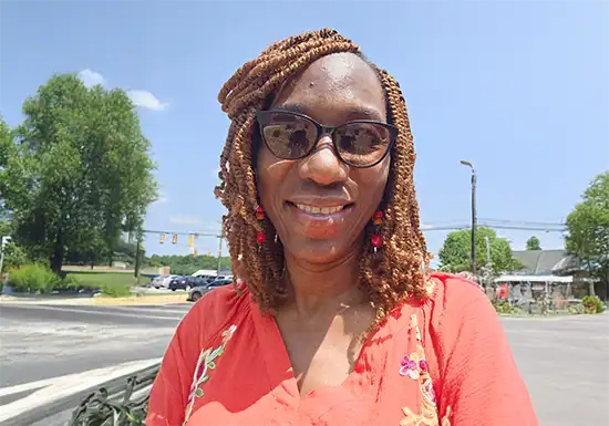 a female M.Ed. alum of UoPeople