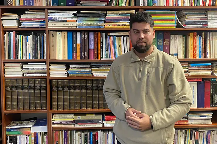 a Greece-based refugee male Computer Science graduate of UoPeople