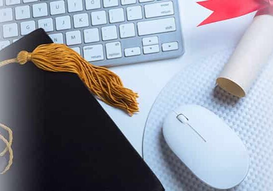 Mouse, toga hat, diploma on table